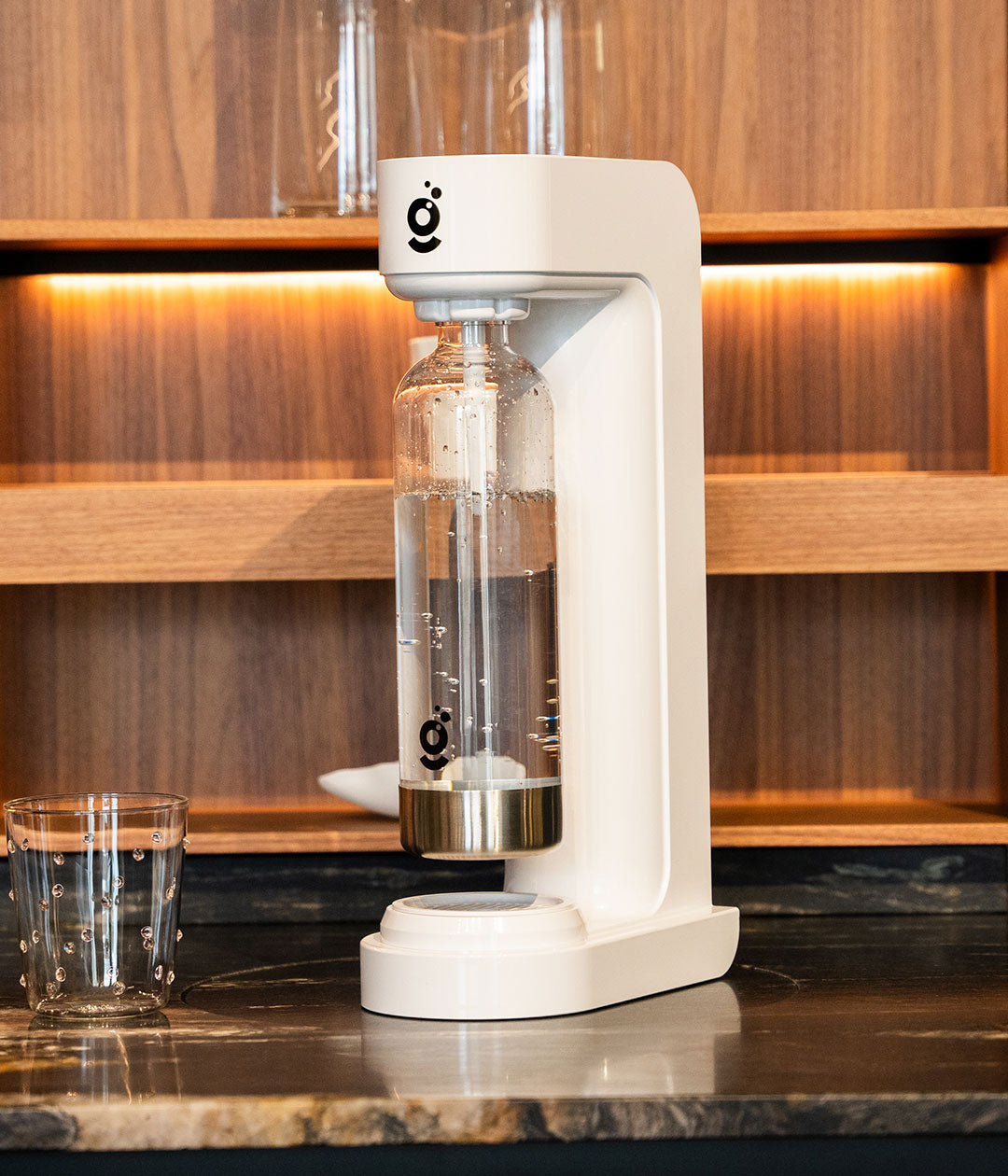 Lumi white soda maker on kitchen counter – lifestyle photo